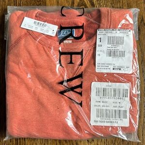 Men’s size medium J Crew pullover in sun faded color. Brand new never been worn.